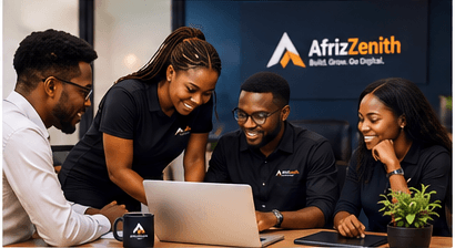 The AfriZenith team working together around a laptop